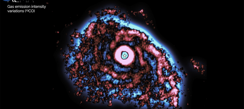 digital image of planetary disk, with blue, red, and space in black