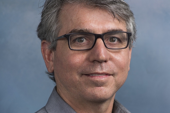 studio headshot photo of man