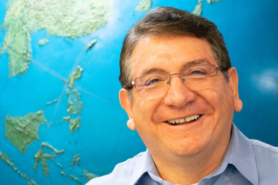 photo of man with globe background